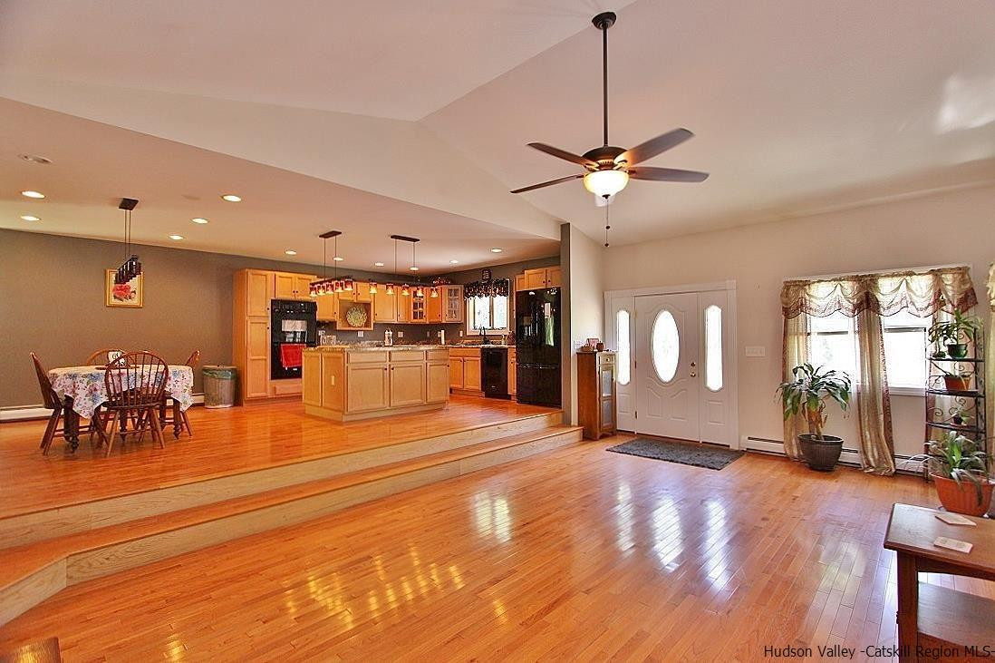 124 Blue Mountain Road Saugerties, NY 12477 - Photo 4 of 29 a view of an empty room with a window and a chandelier