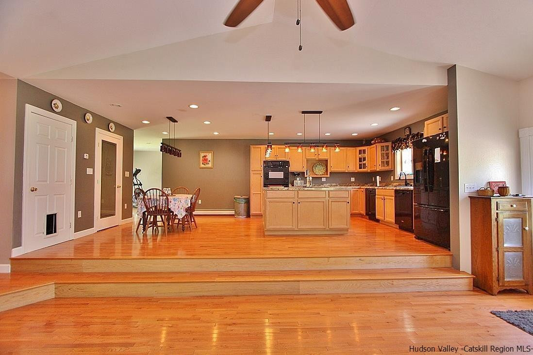 124 Blue Mountain Road Saugerties, NY 12477 - Photo 5 of 29 a living room with lots of furniture and appliances