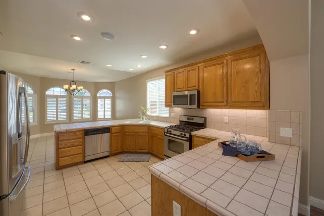 a view of a living room and dining room