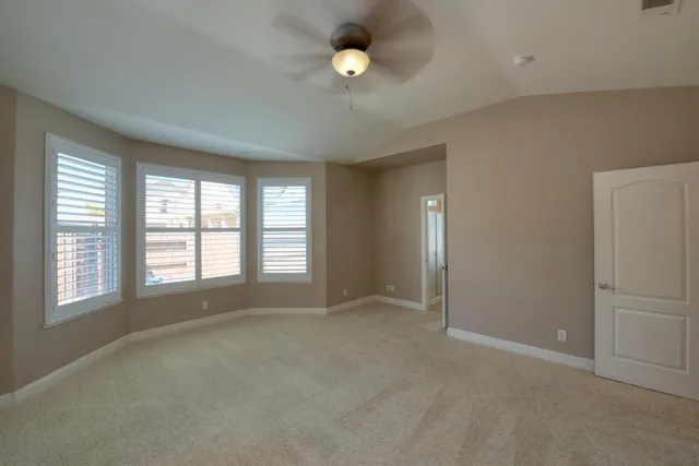a bathroom with a bathtub sink and mirror