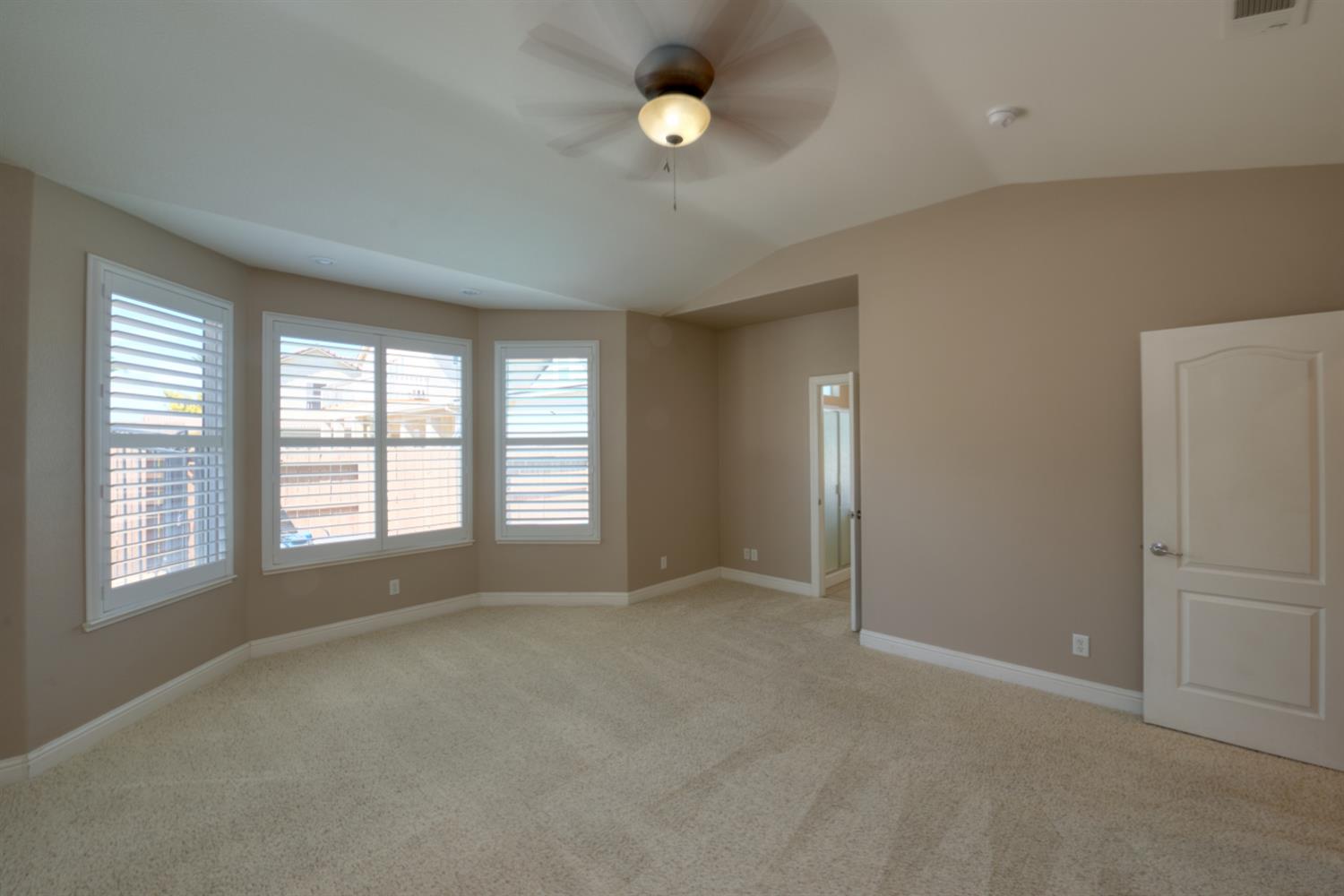849 Miraggio Drive Patterson, CA 95363 - Photo 27 of 40 an empty room with windows and closet
