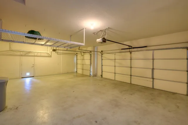 a view of a porch with furniture and next to a yard