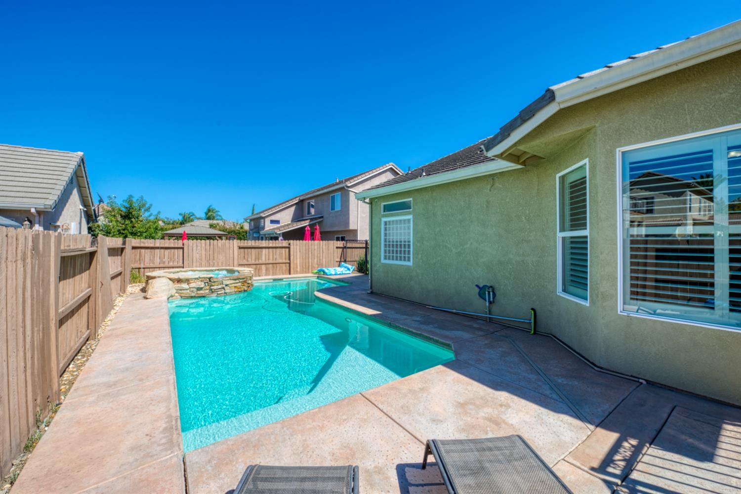 849 Miraggio Drive Patterson, CA 95363 - Photo 35 of 40 a view of a backyard with a small cabin