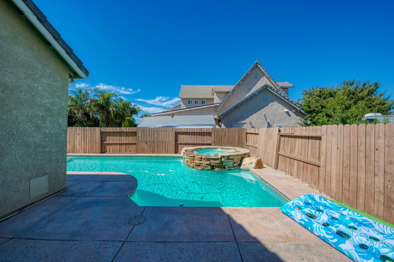 849 Miraggio Drive Patterson, CA 95363 - Photo 36 of 40 a view of backyard with a garden and deck