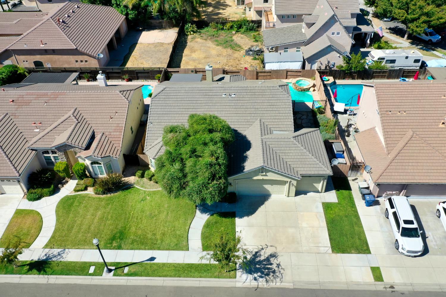 849 Miraggio Drive Patterson, CA 95363 - Photo 38 of 40 an aerial view of a house with garden space and street view