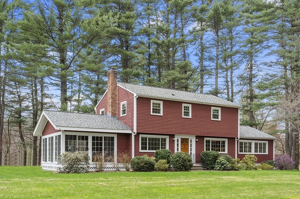 13 Eldridge Road Harvard, MA 01451 - Photo 1 of 40 a front view of a house with a garden