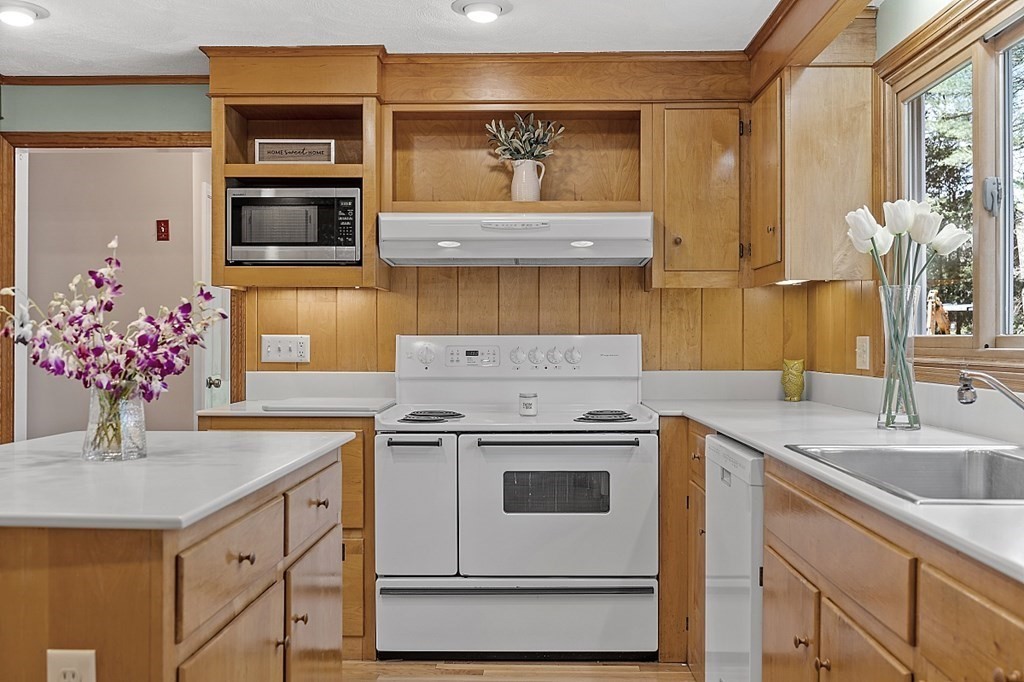 13 Eldridge Road Harvard, MA 01451 - Photo 14 of 40 a kitchen with a sink stove and microwave