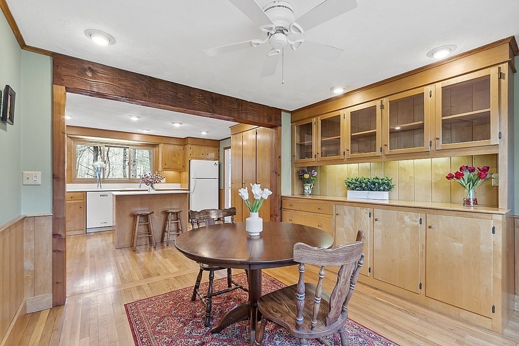 13 Eldridge Road Harvard, MA 01451 - Photo 16 of 40 a view of a dining room with furniture window and wooden floor