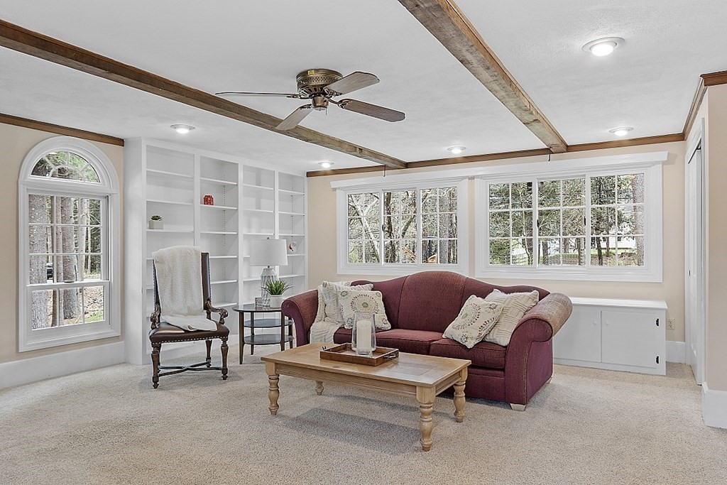 13 Eldridge Road Harvard, MA 01451 - Photo 17 of 40 a living room with furniture and floor to ceiling windows