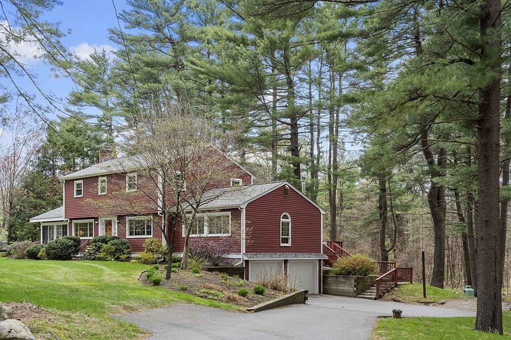 13 Eldridge Road Harvard, MA 01451 - Photo 2 of 40 a front view of a house with garden