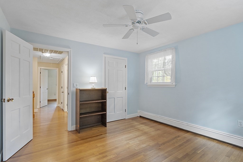 13 Eldridge Road Harvard, MA 01451 - Photo 25 of 40 wooden floor in an empty room with a window