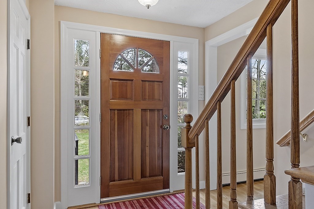 13 Eldridge Road Harvard, MA 01451 - Photo 4 of 40 a view of front door with wooden floor