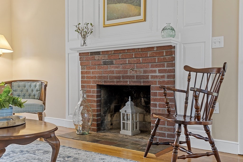 13 Eldridge Road Harvard, MA 01451 - Photo 9 of 40 a living room with furniture and a fireplace