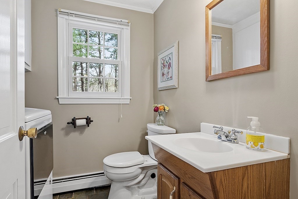 13 Eldridge Road Harvard, MA 01451 - Photo 10 of 40 a bathroom with a sink mirror vanity and toilet