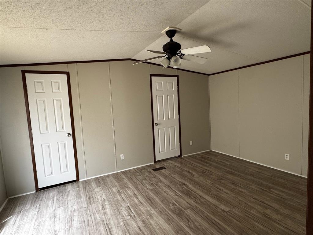 112 Bonner Street, Unit 2 Fairfield, TX 75840 - Photo 3 of 5 a view of empty room with wooden floor