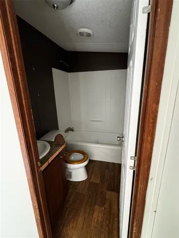 a bathroom with a sink and a toilet