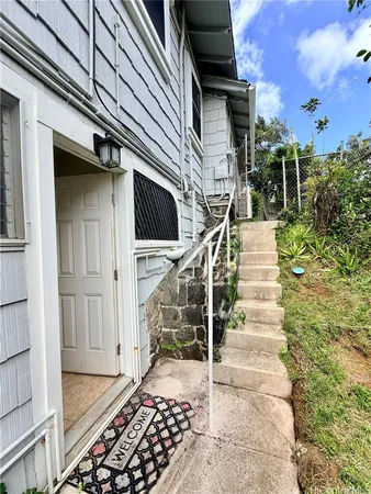 a view of entryway with a front door
