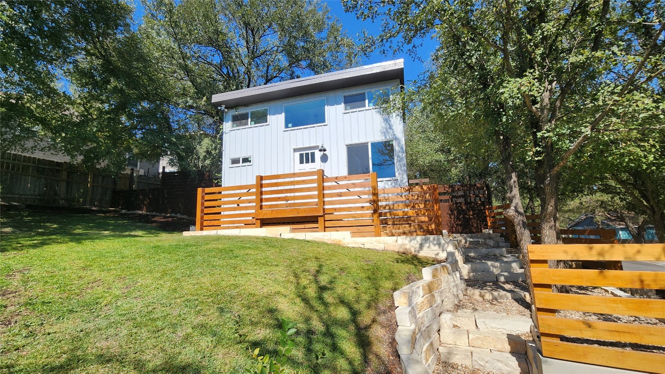 1134 Lott Avenue Austin, TX 78721 - Photo 22 of 32 a front view of a house with a yard
