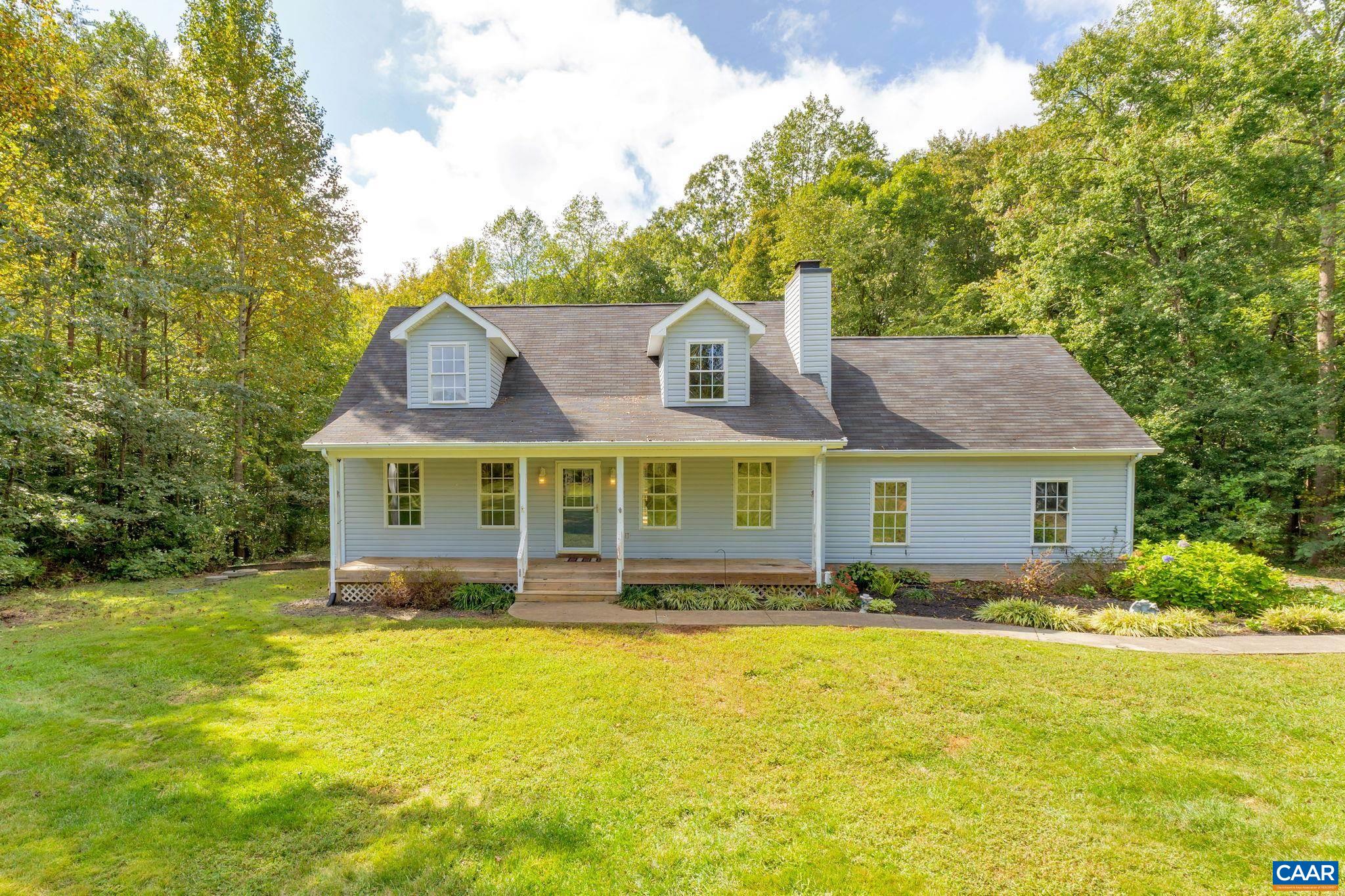 a front view of house with yard