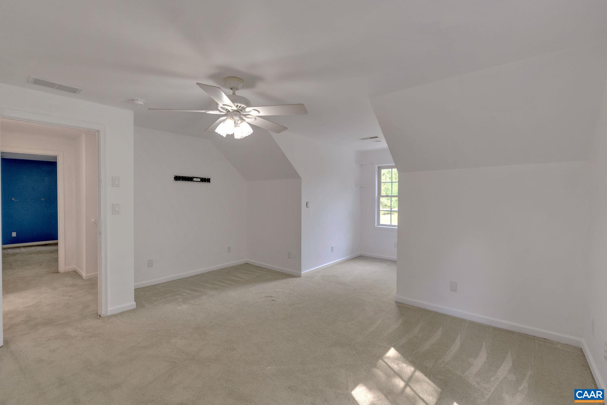 193 Jordan Store Road Kents Store, VA 23084 - Photo 23 of 45 an empty room with windows and fan