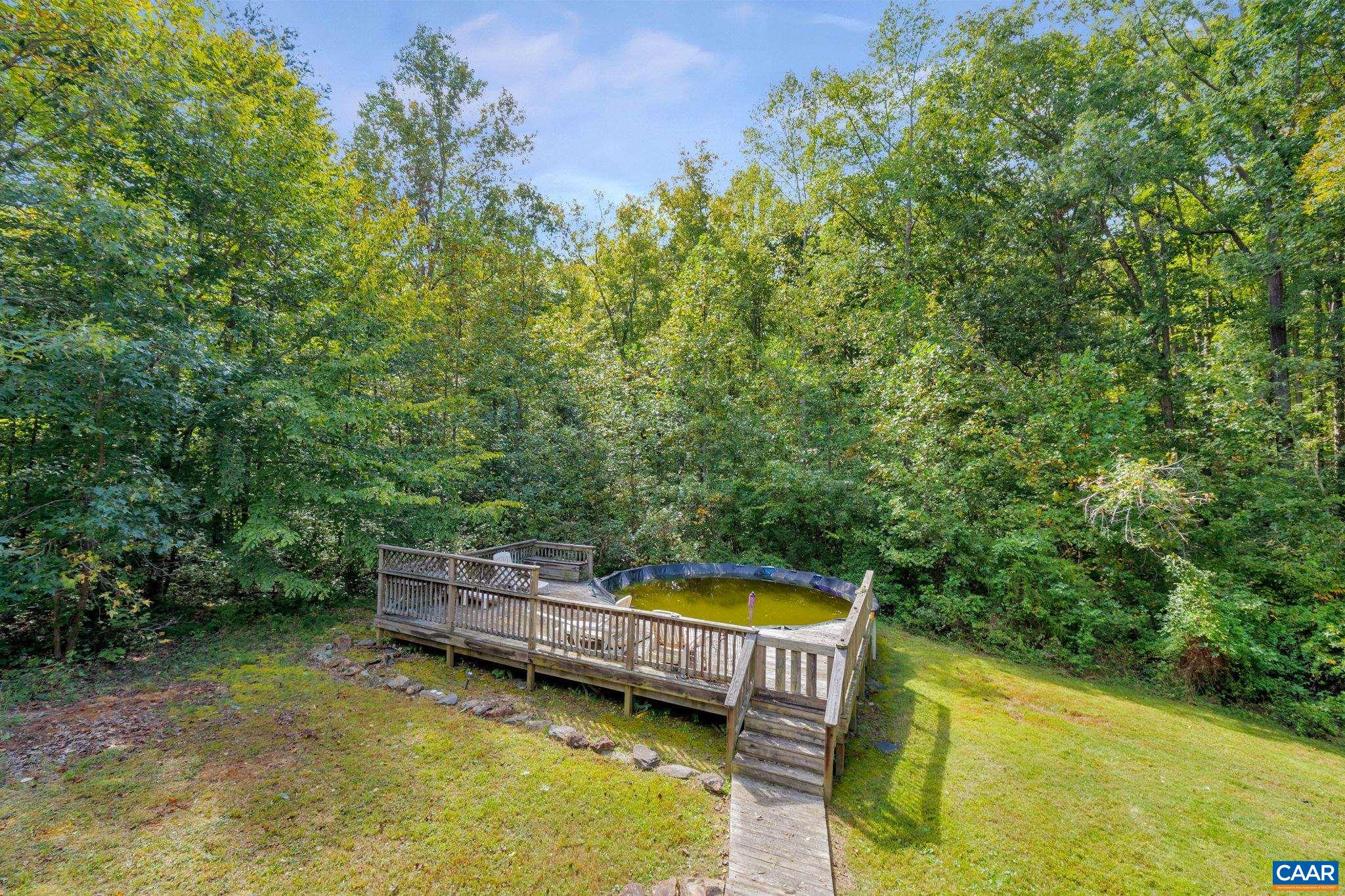 193 Jordan Store Road Kents Store, VA 23084 - Photo 42 of 45 a view of a backyard with swimming pool