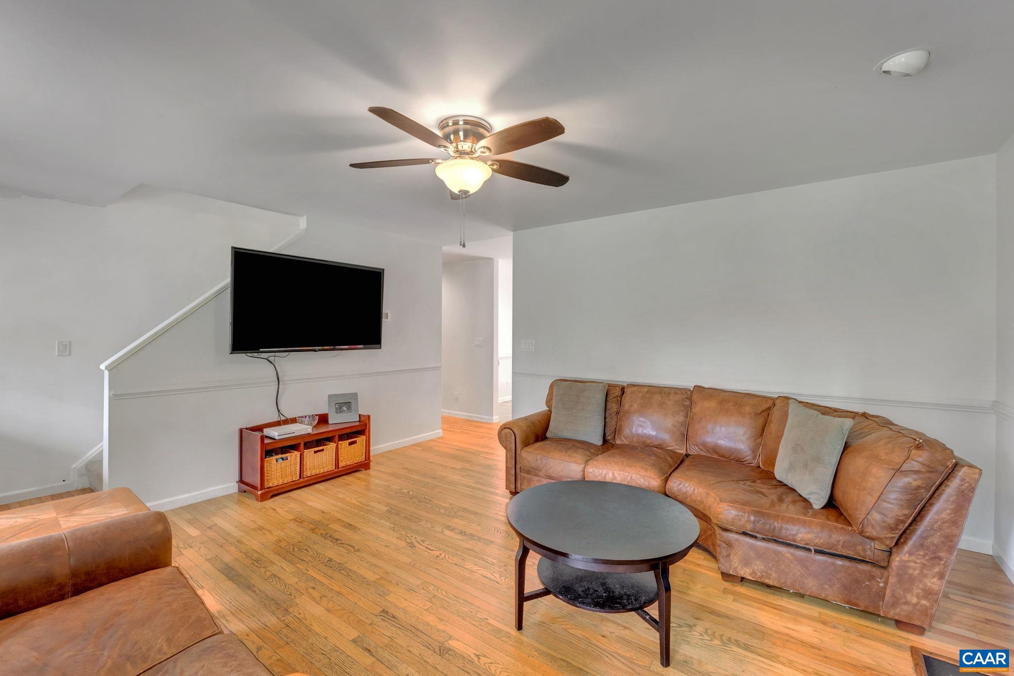 193 Jordan Store Road Kents Store, VA 23084 - Photo 5 of 45 a living room with furniture and a flat screen tv