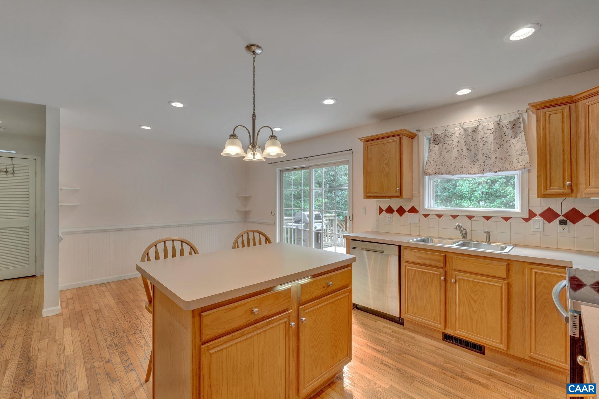193 Jordan Store Road Kents Store, VA 23084 - Photo 9 of 45 a kitchen with a sink a counter space appliances and cabinets
