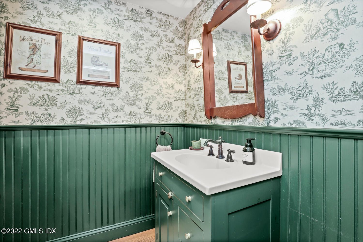 20 Crescent Road Riverside, CT 06878 - Photo 11 of 46 a bathroom with a sink and a mirror