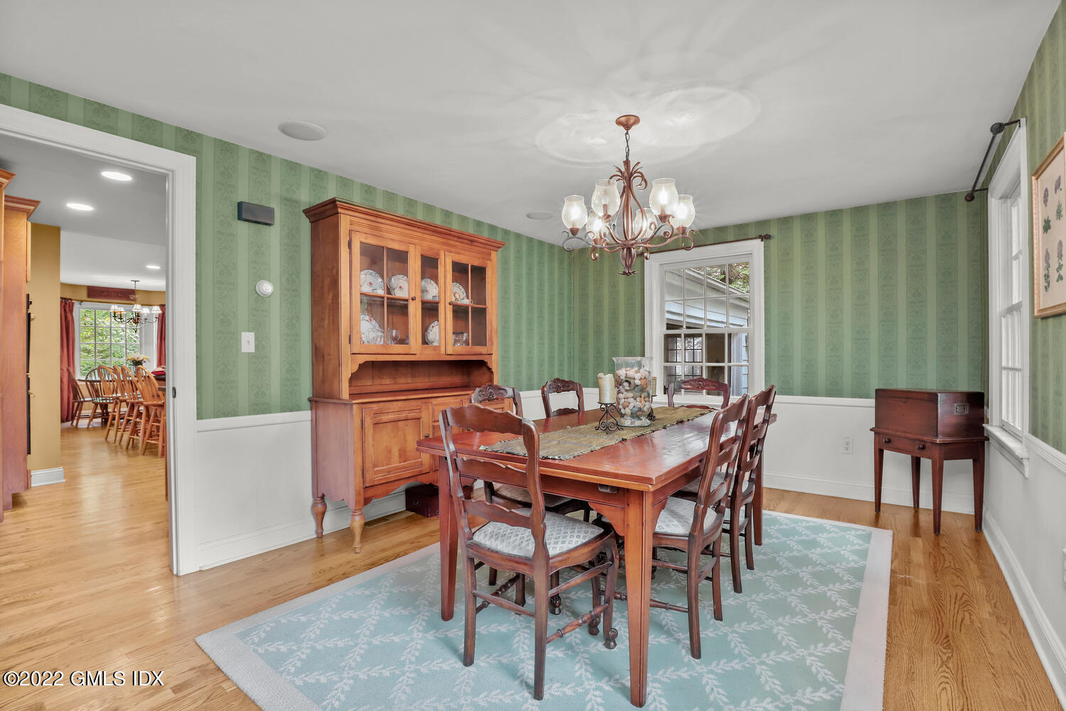 20 Crescent Road Riverside, CT 06878 - Photo 12 of 46 a view of a dining room with furniture and chandelier