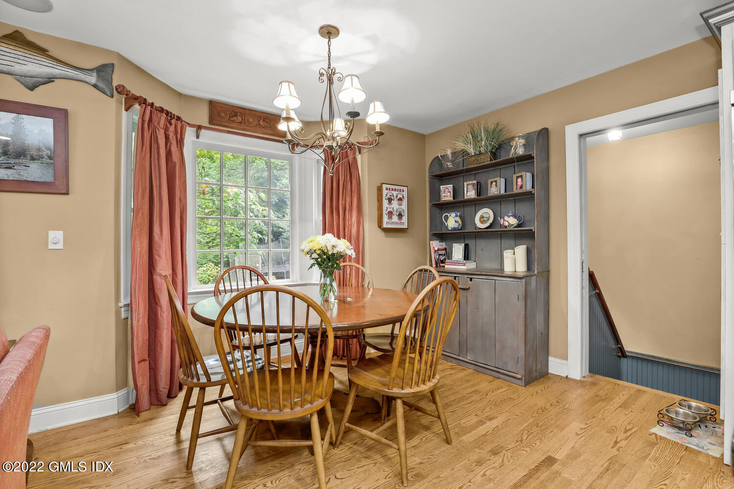 20 Crescent Road Riverside, CT 06878 - Photo 17 of 46 a view of a dining room with furniture window and chandelier