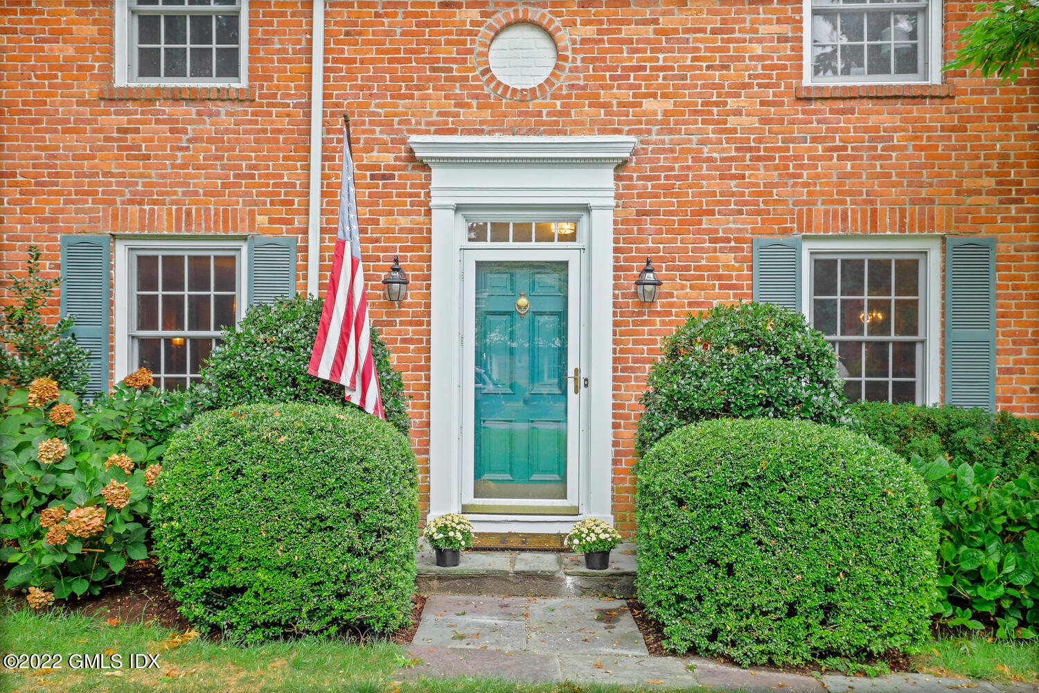 20 Crescent Road Riverside, CT 06878 - Photo 2 of 46 a front view of a house with a yard