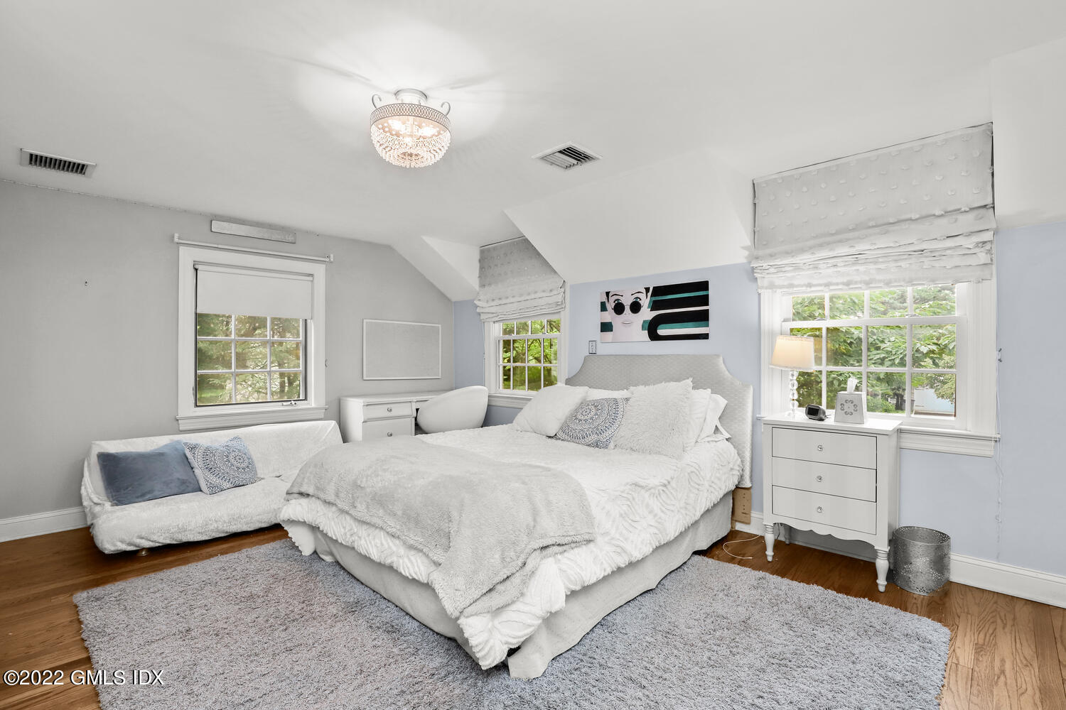 20 Crescent Road Riverside, CT 06878 - Photo 27 of 46 a bedroom with a large bed and a couch