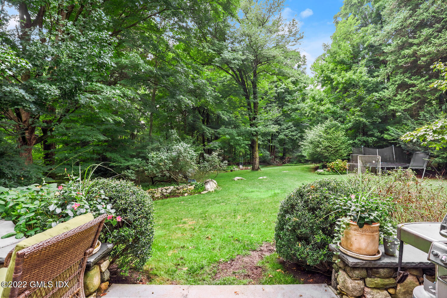 20 Crescent Road Riverside, CT 06878 - Photo 36 of 46 a view of a backyard with sitting area
