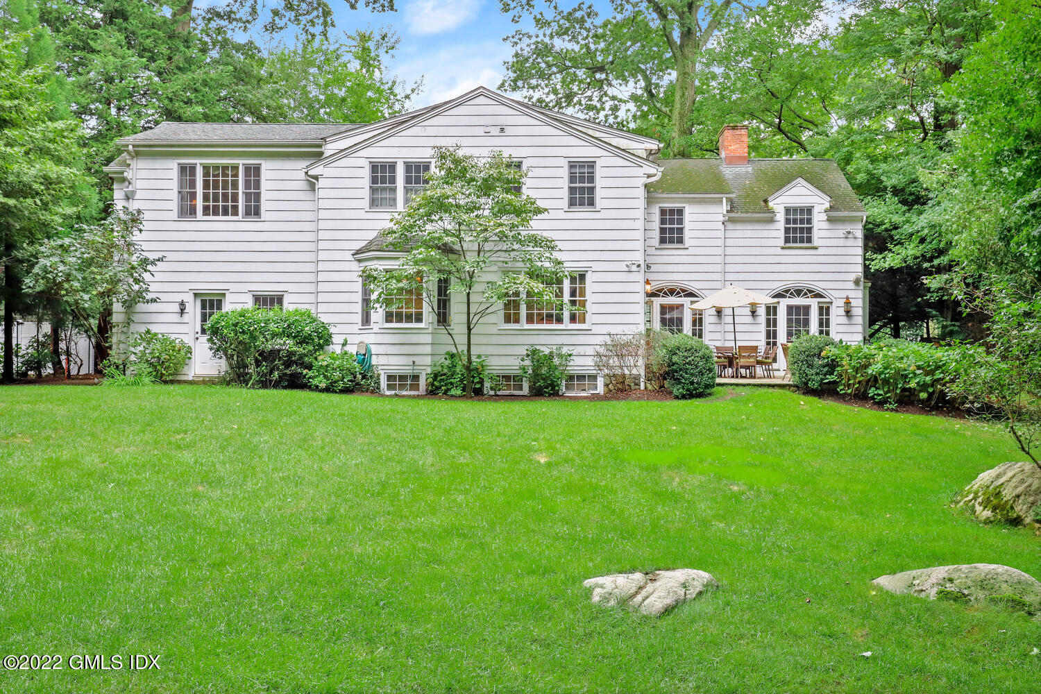 20 Crescent Road Riverside, CT 06878 - Photo 38 of 46 a front view of a house with a garden