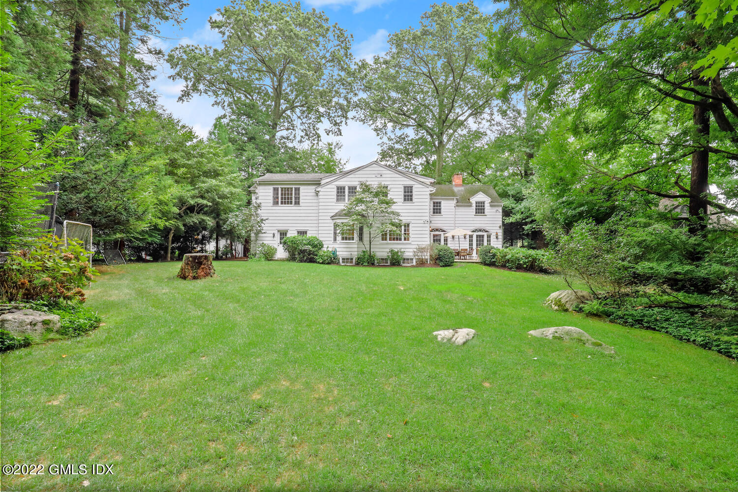 20 Crescent Road Riverside, CT 06878 - Photo 41 of 46 a front view of a house with garden