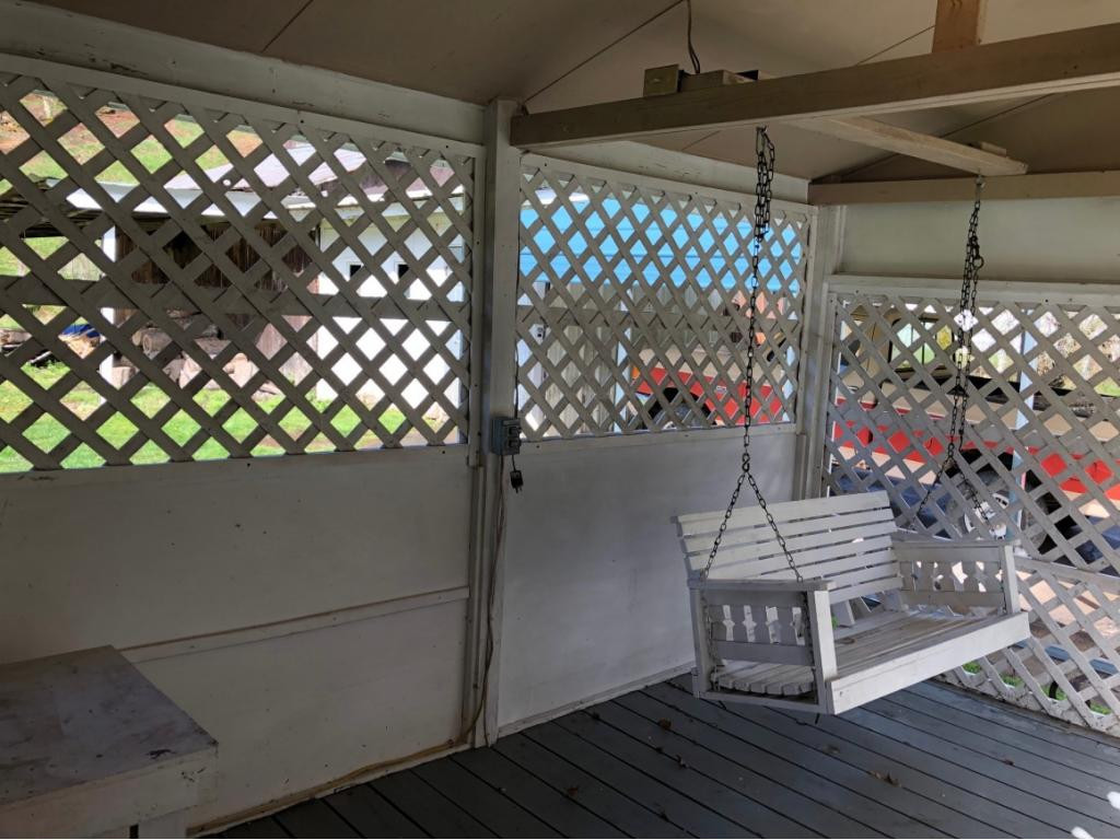 4328 Pine Orchard Road Butler, TN 37640 - Photo 14 of 31 INTERIOR OF PATIO WITH SWING