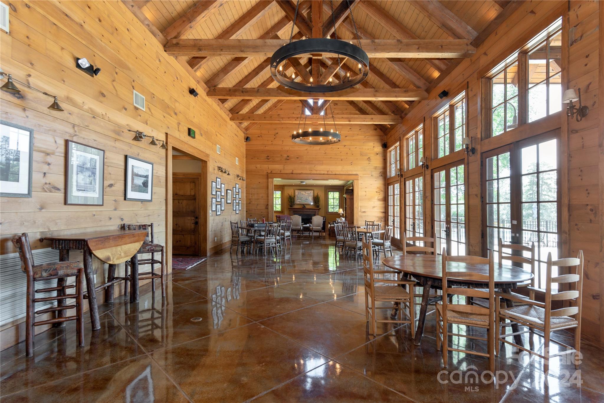 99 Ridgetop Circle, Unit 203 Brevard, NC 28712 - Photo 24 of 36 a view of a hall with dining area