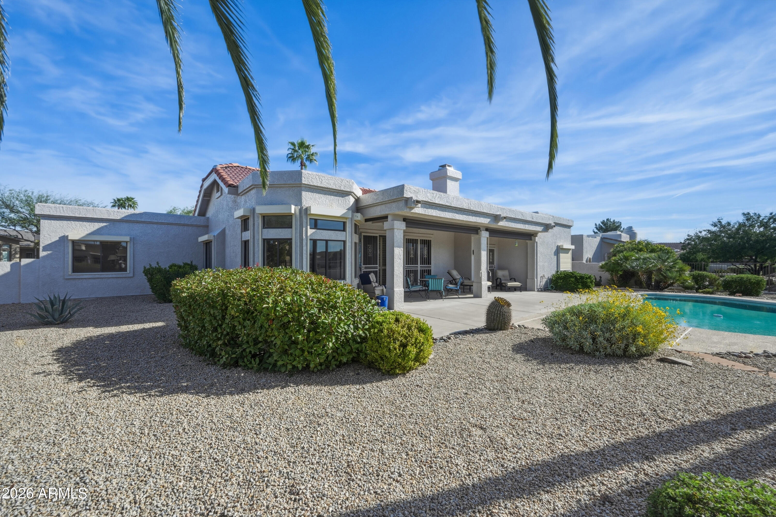 19113 East Vía Esquina Rio Verde, AZ 85263 - Photo 29 of 44 a front view of a house with garden