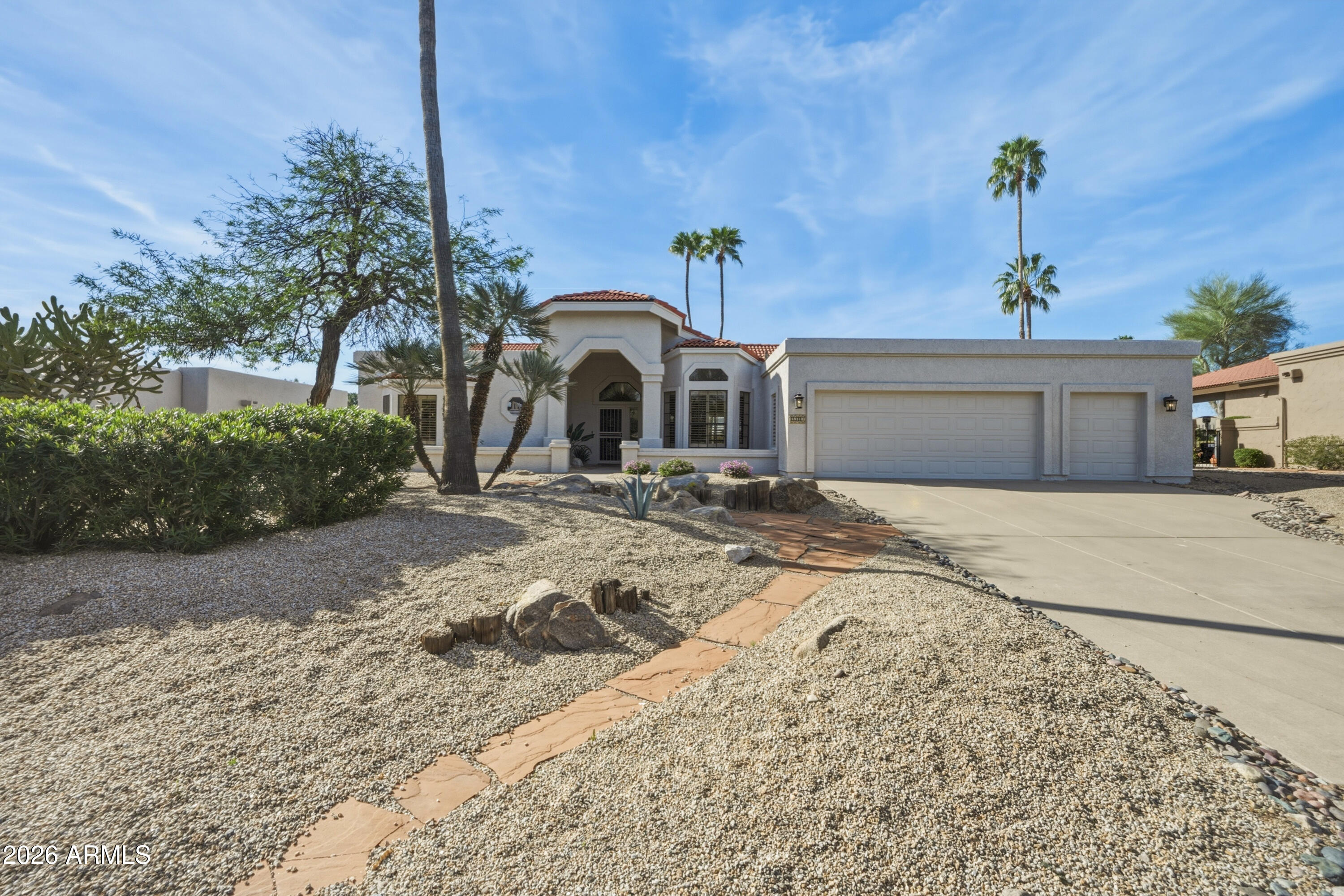 19113 East Vía Esquina Rio Verde, AZ 85263 - Photo 2 of 44 a front view of a house with a yard
