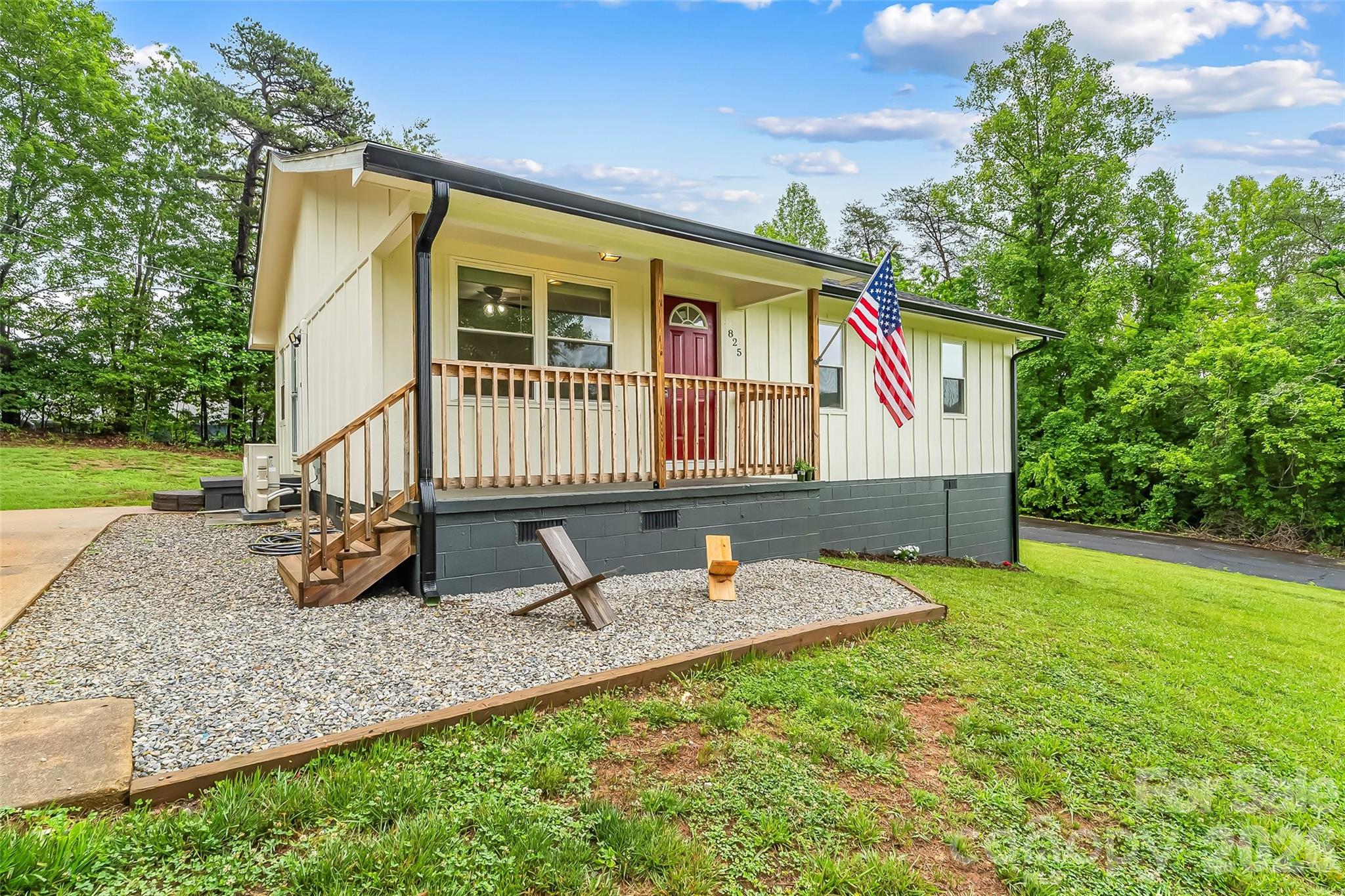 825 South Creek Road Nebo, NC 28761 - Photo 1 of 34 a front view of house with backyard