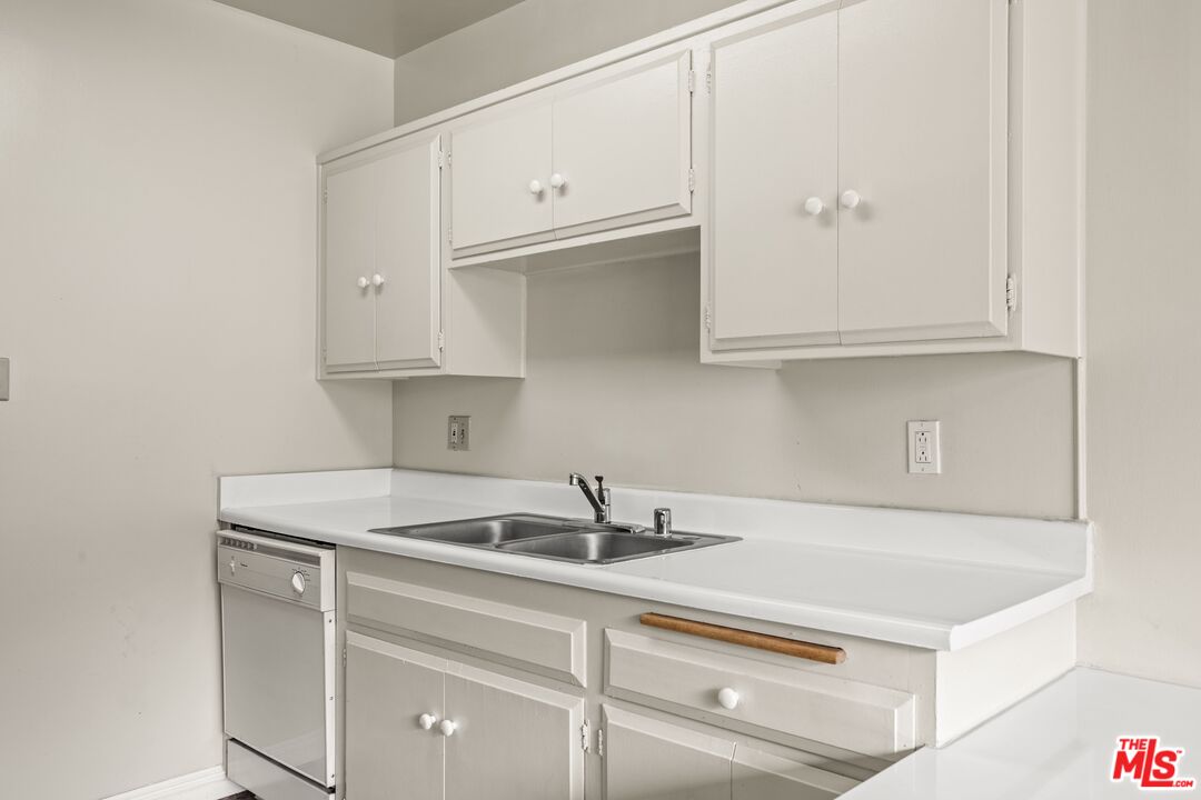 1295 Federal Avenue, Unit 3 Los Angeles, CA 90025 - Photo 3 of 12 a kitchen with a sink cabinets and appliances