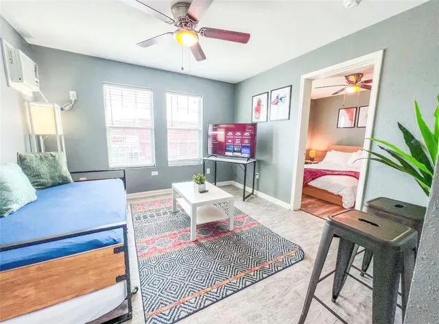 a living room with furniture and a window