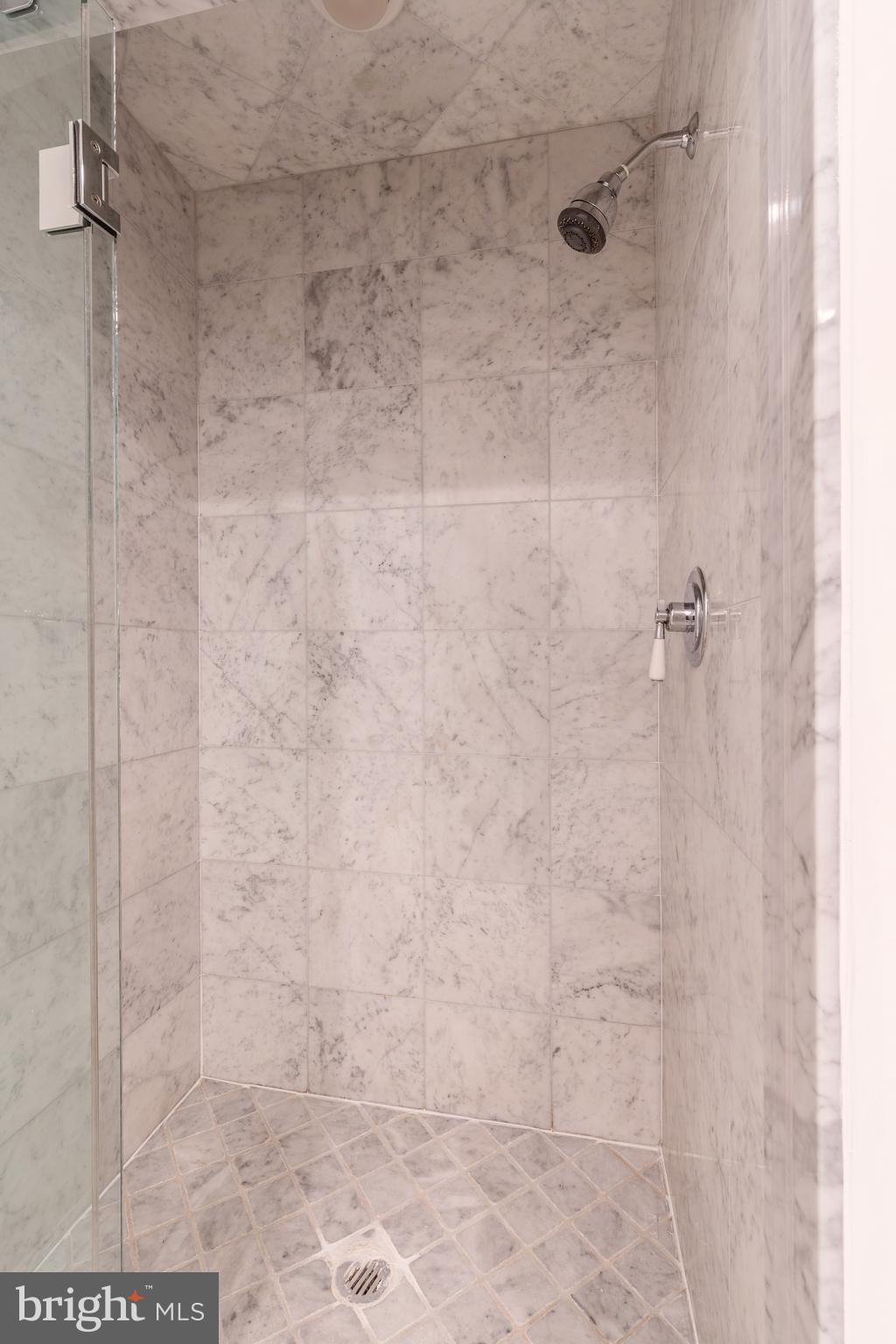 1811 Chestnut Street, Unit 707 Philadelphia, PA 19103 - Photo 14 of 39 a bathroom with a shower