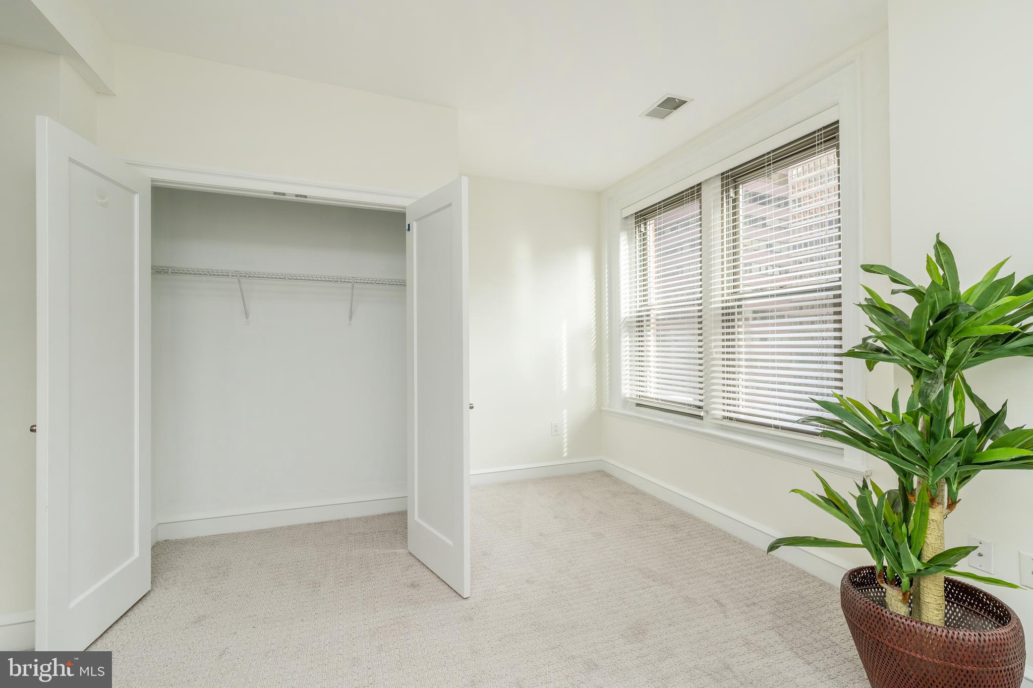 1811 Chestnut Street, Unit 707 Philadelphia, PA 19103 - Photo 16 of 39 a view of an empty room with a window