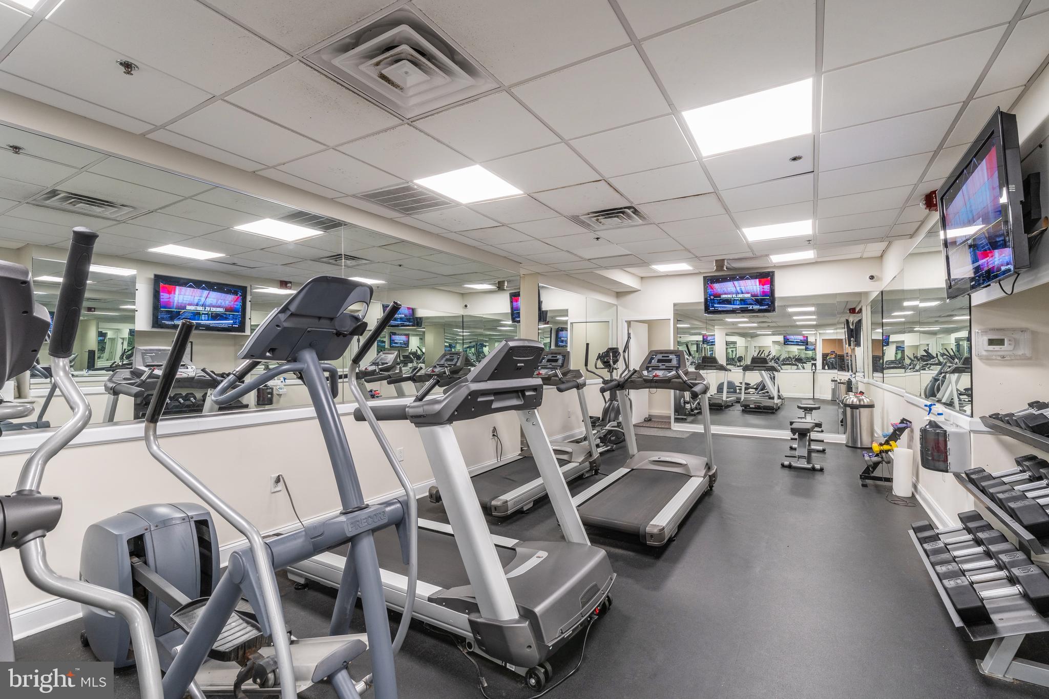 1811 Chestnut Street, Unit 707 Philadelphia, PA 19103 - Photo 31 of 39 a view of a room with gym equipment