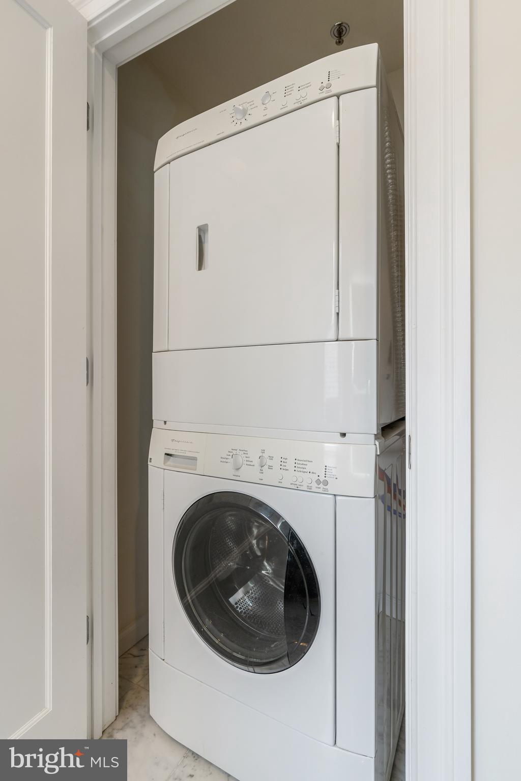 1811 Chestnut Street, Unit 707 Philadelphia, PA 19103 - Photo 4 of 39 a close up view of a washer and dryer