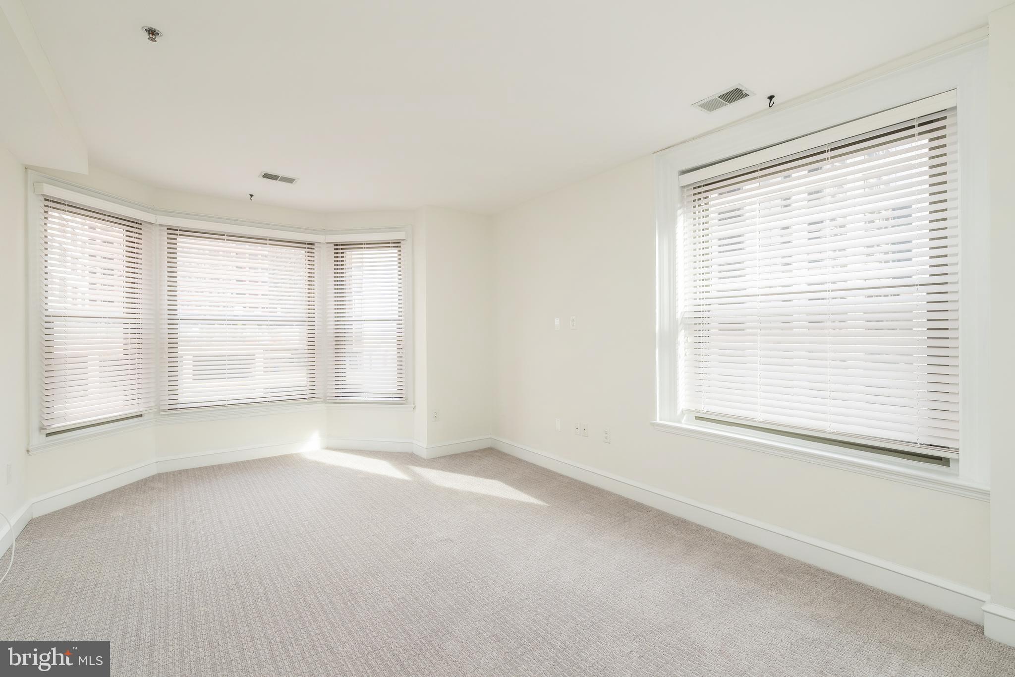 1811 Chestnut Street, Unit 707 Philadelphia, PA 19103 - Photo 10 of 39 a view of an empty room with a window