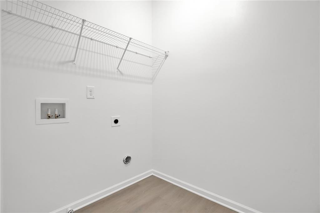 111 Weston Way Northwest Cartersville, GA 30121 - Photo 23 of 41 a view of a room with racks on the wall