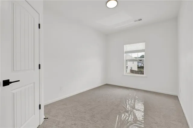 a view of a room that has a window in it