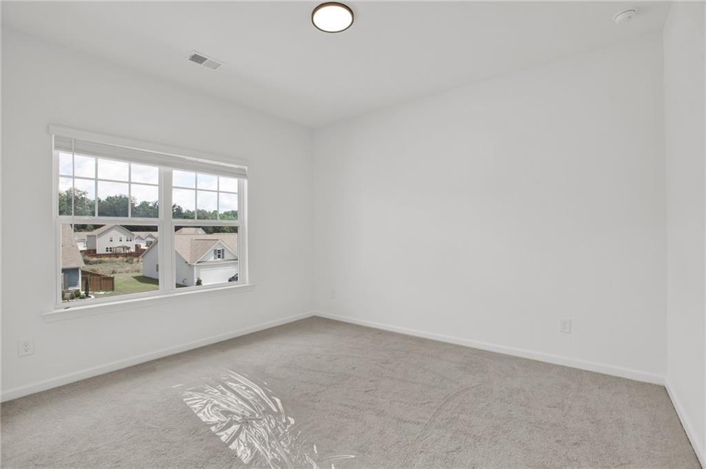 111 Weston Way Northwest Cartersville, GA 30121 - Photo 28 of 41 an empty room with a window